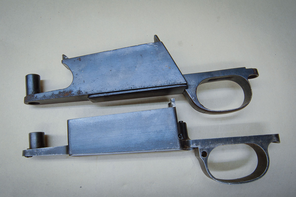 The Siamese magazine box (top) is deeper than a normal M98 box (bottom), because of the need to contain rimmed cartridges.